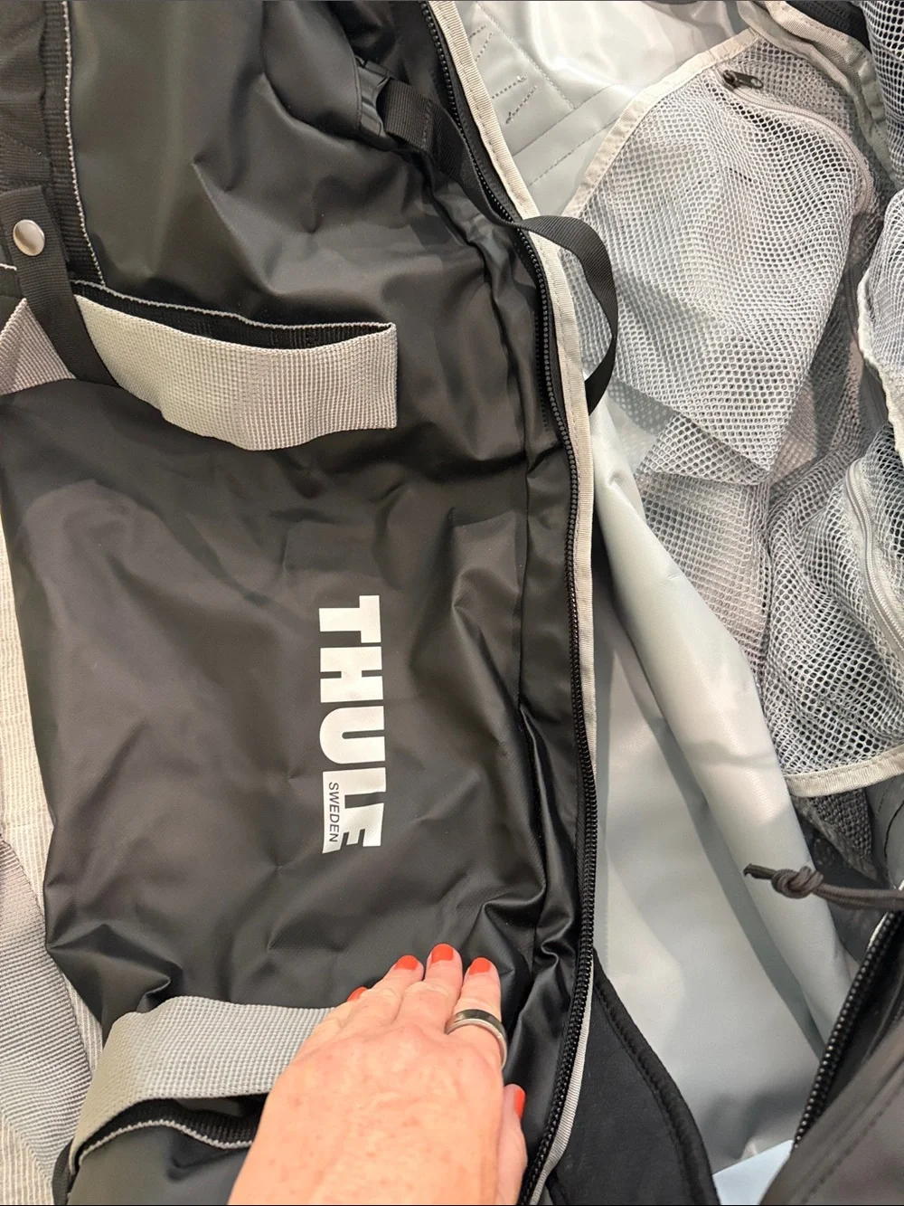 Thule Chasm Duffle 130L Black Travel Duffle with Gray Mesh Pocket